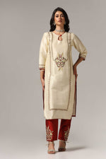 Load image into Gallery viewer, Creme raw silk embroidered kurti paired with pants and a net maching dupatta.