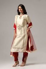 Load image into Gallery viewer, Creme raw silk embroidered kurti paired with pants and a net maching dupatta.
