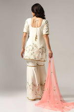 Load image into Gallery viewer, Cream-colored French crepe sharara set with multi-color resham embroidery with net dupatta
