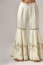 Load image into Gallery viewer, Cream-colored French crepe sharara set with multi-color resham embroidery with net dupatta
