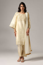 Load image into Gallery viewer, Creme raw silk gold zari embroidered &amp; hand crafted with sequence kurti paired with pants and a net dupatta
