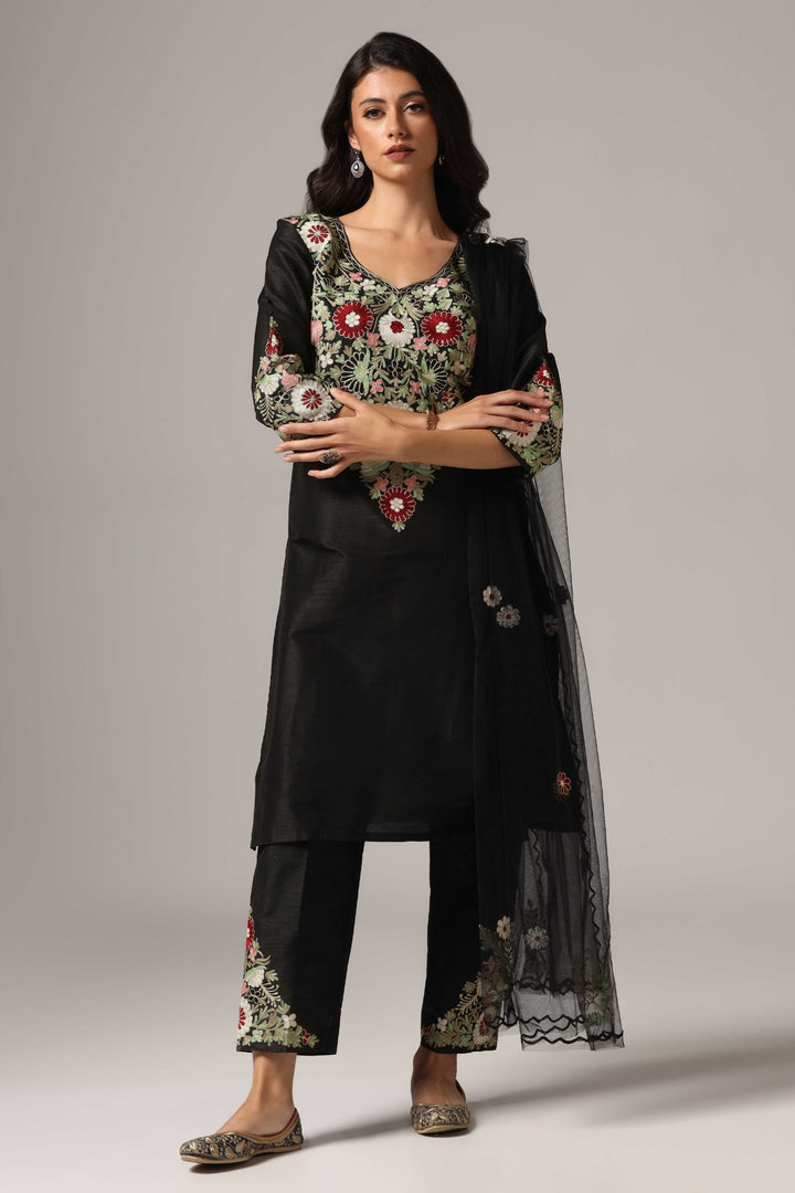 Black raw silk resham embroidered kurti paired with pants and a net maching dupatta