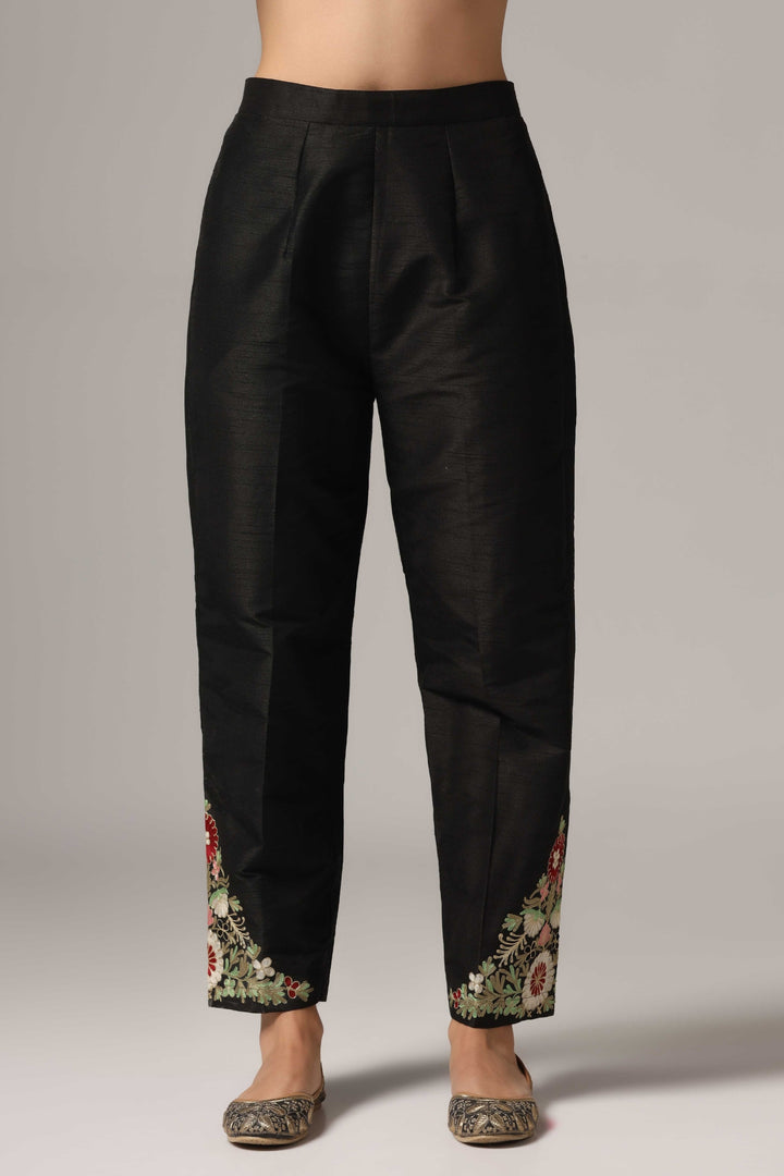 Black raw silk resham embroidered kurti paired with pants and a net maching dupatta