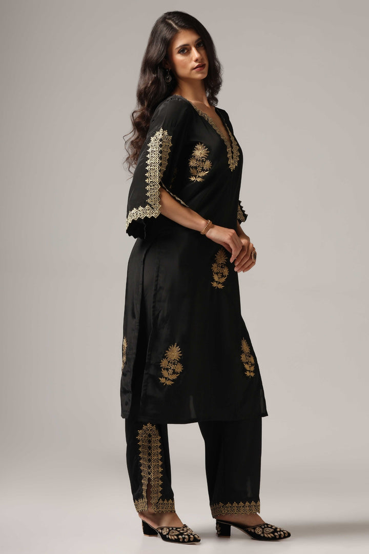Black french crepe antique gold zari embroidered kurti paired with pants
