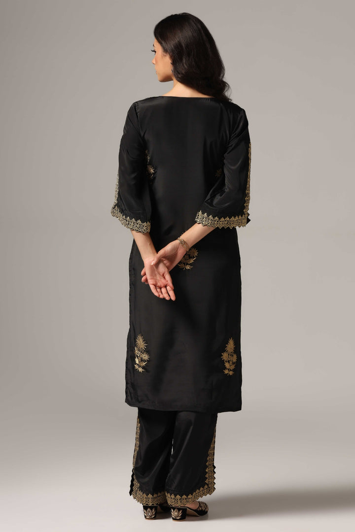 Black french crepe antique gold zari embroidered kurti paired with pants