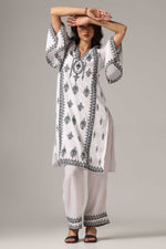Load image into Gallery viewer, White french crepe resham embroidered kurti paired with pants and a net dupatta
