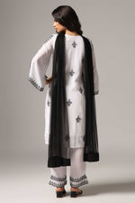 Load image into Gallery viewer, White french crepe resham embroidered kurti paired with pants and a net dupatta
