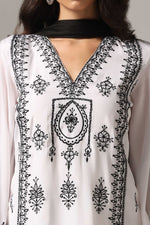 Load image into Gallery viewer, White french crepe resham embroidered kurti paired with pants and a net dupatta
