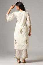 Load image into Gallery viewer, Creme french crepe gold zari embroidered kurti paired with pants
