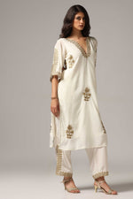 Load image into Gallery viewer, Creme french crepe gold zari embroidered kurti paired with pants
