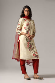 Creme raw silk resham embroidered kurti paired with pants and a net dupatta